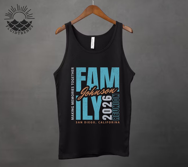 May include: Black vest top with the words "FAMILY Johnson 2026 REUNION" in teal and orange. The text "MAKING MEMORIES TOGETHER" and "SAN DIEGO, CALIFORNIA" are also printed on the shirt. The vest top is hanging on a wooden hanger.