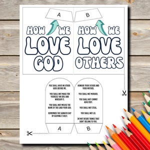 May include: A printable coloring page with two tabs that say "How We Love God" and "How We Love Others". The tabs have the Ten Commandments written on them.