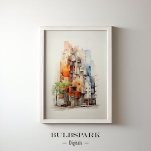 May include: A framed watercolor print of a colorful building cluster. The artwork features a mix of orange, blue, and white buildings with a tree and cars in the foreground. The text "BULBSPAR - Digitals" is at the bottom.