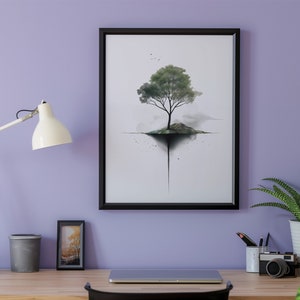 May include: A black framed print of a watercolor painting of a tree growing out of a small island. The tree is green and the island is brown. The background is white with a few black dots.