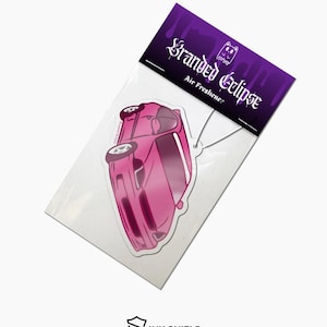 May include: A pink car-shaped air freshener with the text "Stranded Eclipse" in a gothic font. The air freshener is packaged in a clear plastic sleeve with a purple header. The Ink Shield logo is visible at the bottom.