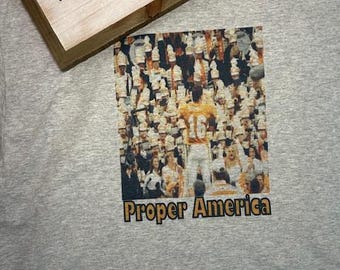 Proper America - Peyton Manning conducting the band