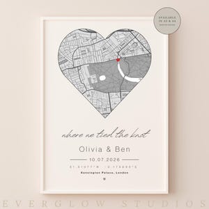 May include: A framed print featuring a heart-shaped map of Kensington Palace, London, in grayscale. The text "where we tied the knot" is above the names Olivia & Ben, the date 10.07.2026, and coordinates. The print is available in A5 & A4 sizes.