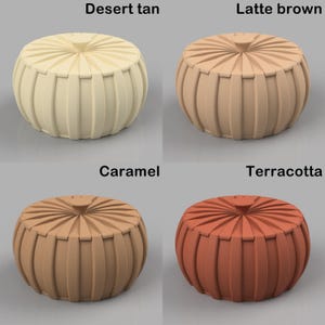 May include: Four decorative poufs in desert tan, latte brown, caramel, and terracotta. Each round pouf has a ribbed design and a small, round top. The poufs are displayed against a neutral background, with the color names above each.