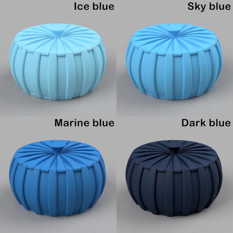 May include: Four round, ribbed ottomans in varying shades of blue: ice blue, sky blue, marine blue, and dark blue. Each ottoman has a circular top and a pleated, cylindrical body. The text labels each ottoman's color.