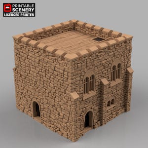 May include: A tan-colored miniature castle tower with a stone brick exterior. The tower has arched windows, a wooden roof, and a crenelated top. The text "PRINTABLE SCENERY LICENSED PRINTER" is in the upper left corner.