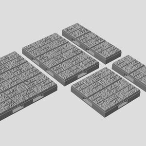 Peut inclure: Plusieurs palettes rectangulaires grises de différentes tailles. Chaque palette présente une surface texturée avec un motif quadrillé. Les palettes sont disposées sur un fond gris clair.