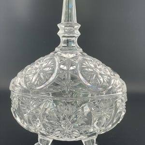 Vintage Crystal Footed Candy Bowl with Spire Steeple Lid, Starburst Pattern.