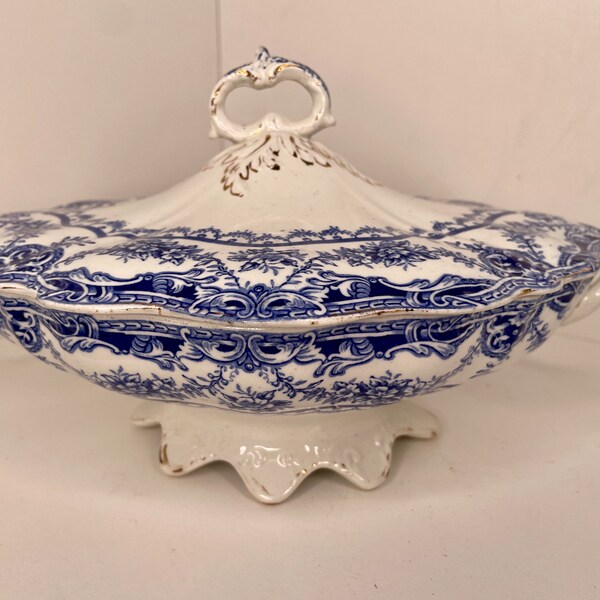Antique covered blue and white vegetable serving dish.