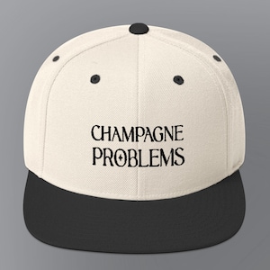 Embroidered Champagne Problems Snapback Hat