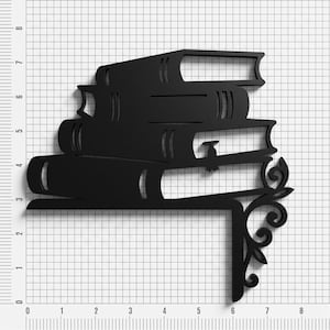 May include: A black metal corner shelf bracket featuring a stack of four books with a decorative scrollwork design on the right side. The object is positioned against a grid background with measurements in inches, showing a width of 6 inches.
