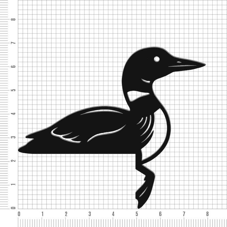 May include: A black metal silhouette of a loon bird featuring a white eye and neck markings. The cutout is positioned against a grid background with measurements in inches, showing the bird is approximately 8 inches wide and 6.5 inches tall.