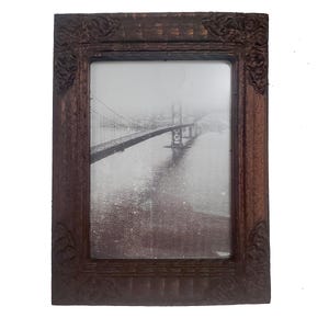 May include: A rustic wooden sign with the text "Welcome to our home" in white lettering. The sign features a distressed finish and a simple, inviting design, perfect for entryway decor.