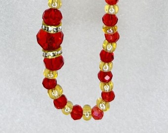 Collier de perles rouge et or