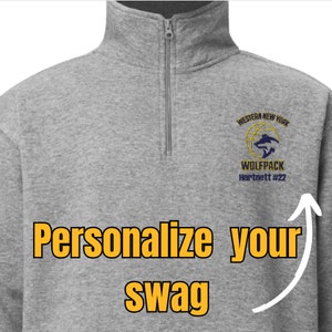 May include: A gray quarter-zip sweatshirt with a zipper closure at the neck. The sweatshirt features a logo with the text "Western New York Wolfpack Hartnett #22". The phrase "Personalize your swag" is also displayed.