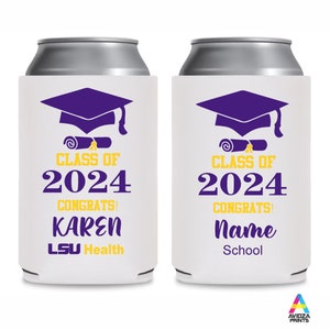 May include: White can coolers with purple and yellow graduation-themed designs. One cooler says "Class of 2024 Congrats! Karen LSU Health." The other says "Class of 2024 Congrats! Name School."