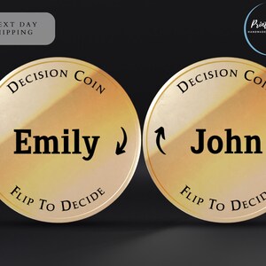 May include: Two gold-colored decision coins with the text "DECISION COIN" and "FLIP TO DECIDE" on each side. One coin has the name "Emily" and the other has the name "John".