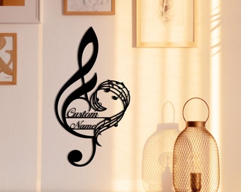May include: Black metal wall art featuring a treble clef with musical notes forming a heart shape. The words "Custom Name" are inscribed on the heart.