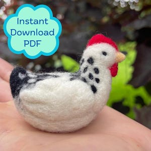 May include: A handmade felt chicken figurine with a red comb and wattle, black spots, and a yellow beak. The chicken is white with black markings. Text in a blue cloud bubble reads "Instant Download PDF".