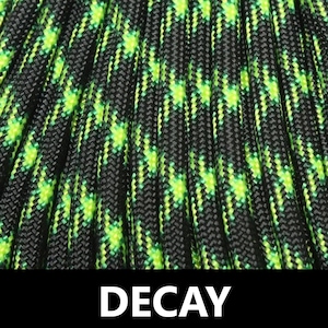 May include: Close-up of black and green paracord with a repeating diamond pattern. The paracord is labelled "DECAY".
