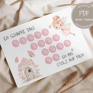 May include: A white printable sheet with pink circles, a fairy illustration, and text in German. The sheet features a fairy house, butterflies, and the phrases "ICH SCHAFFE DAS!" and "ICH BIN STOLZ AUF MICH!"