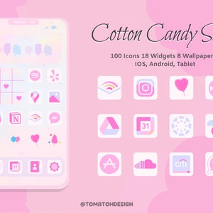 May include: A pink and white phone screen with a variety of app icons, including Instagram, Spotify, Hulu, and more. The phone screen is surrounded by a pink background with white clouds. The text "Cotton Candy Skies" is at the top of the image, and the text "100 Icons 18 Widgets 8 Wallpapers" is below it. The text "IOS, Android, Tablet" is below that. The text "@TOMATOHDESIGN" is at the bottom of the image.