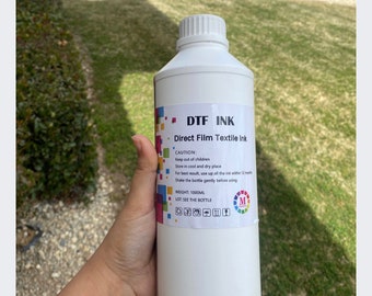 DTF ink CMYK and white.. Okai brand 1000 ml cyan magenta yellow and black