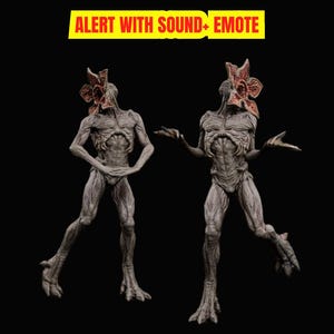 May include: Two gray Demogorgon figures from the popular series, with a flower-like head and a humanoid body. The figures are posed against a black background. The text "ALERT WITH SOUND+ EMOTE" is displayed in a yellow box.