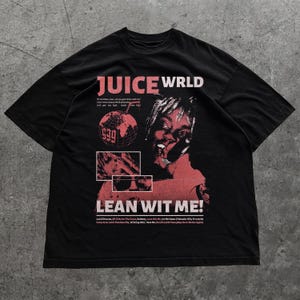 May include: Black t-shirt featuring the text "JUICE WRLD" in red, along with a graphic of a person and other design elements. The shirt also includes the text "LEAN WIT ME!" and other song titles.