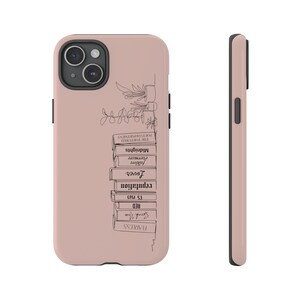 May include: A pink phone case with a black outline and a design of a stack of books with titles like "Fearless", "Speak Now", "Red", "1989", "Reputation", "Lover", "folklore", "evermore", "Midnights", "The Tortured Poet's Department". The design also includes a small plant in a pot.