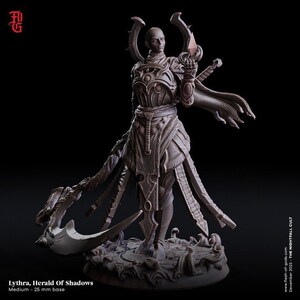 May include: A detailed miniature figurine of a dark-skinned figure with a bald head, wearing a dark, intricately-designed outfit and holding a glowing orb. The figure is standing on a circular base with a swirling design. The miniature is labelled "Lythra, Herald of Shadows" and "Medium - 25 mm base".