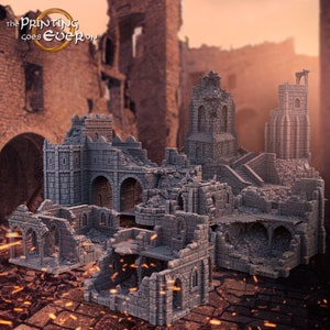 May include: A set of grey 3D printed ruined buildings, perfect for tabletop gaming or miniature dioramas. The buildings are made of stone and have a variety of details, including arches, windows, and doors. The buildings are set against a backdrop of a sunset.