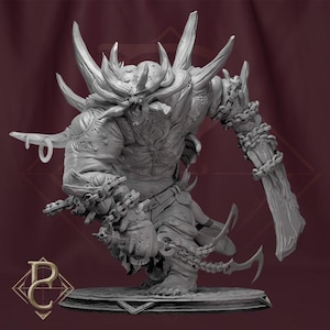 May include: A gray, detailed sculpture of a monstrous figure with large horns, chains, and sharp claws. The creature has a menacing expression and is posed on a decorative base. The sculpture is likely for tabletop gaming or display.