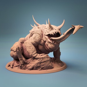 May include: A detailed, 3D printed miniature of a grotesque, monstrous frog with a long, forked tongue. The frog has a spiky, reptilian head and is posed in a crouched position, ready to strike.