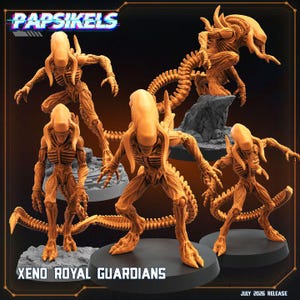 May include: Five orange miniature figures of extraterrestrial creatures with elongated heads, ribbed torsos, and long tails, standing on circular bases. The text PAPSIKELS and XENO ROYAL GUARDIANS is visible, along with the text JULY 2026 RELEASE.