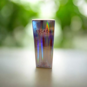 Escada Sentiment  Eau Toilette 75ml. DISCONTINUED. That "Barbie" scent! Sealed Box.