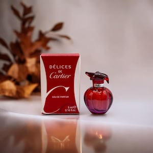 Cartier Delices MINI Eau Parfum 5ml. Captures the deliciousness of femininity, seduction and flirtation. Very rare.
