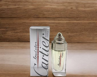 Cartier Roadster Sport MINIATUUR Eau Toilette 12,5 ml/0,42 fl.oz. Een houtachtige aromatische geur voor mannen. Stopgezet.