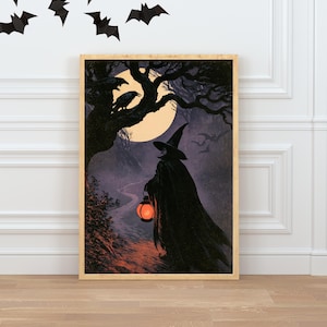 Peut inclure: Une impression d'art encadr&eacute;e rectangulaire repr&eacute;sentant une sc&egrave;ne sombre et atmosph&eacute;rique avec une silhouette v&ecirc;tue d'une cape et d'un chapeau pointu tenant une lanterne orange brillante sous une pleine lune, des arbres et des corbeaux.