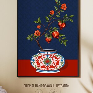 May include: A framed digital illustration featuring a pomegranate branch with orange-red flowers and ripe red fruit emerging from a white, red, and blue patterned ceramic vase, set against a dark blue background with a subtle repeating pattern.