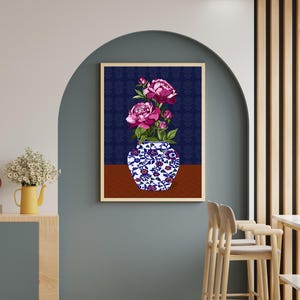 May include: A framed wall art print featuring a blue and white porcelain vase with intricate floral patterns, holding a bouquet of vibrant pink peony flowers. The background of the artwork is a deep navy blue with a subtle repeating pattern.