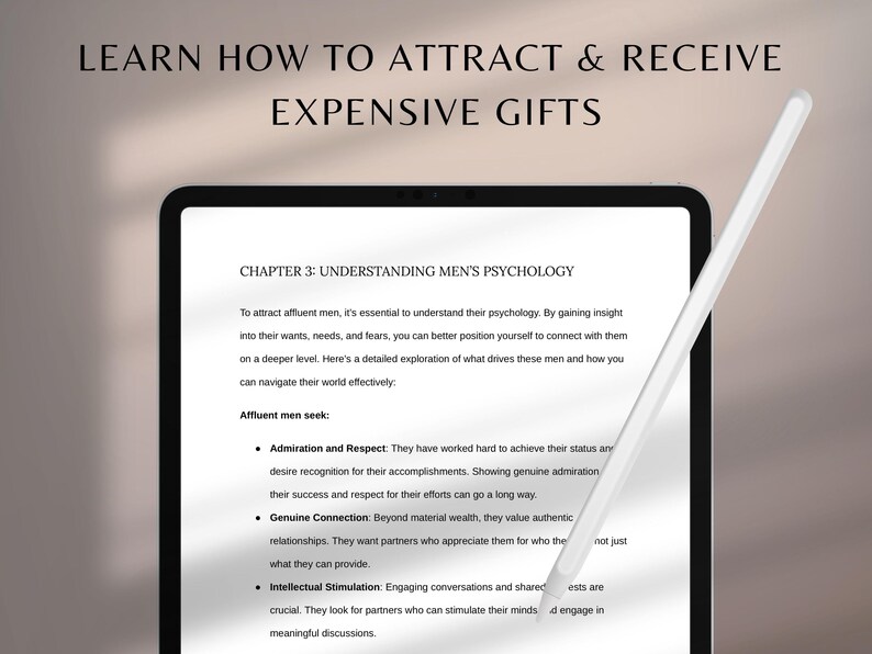 May include: A black tablet shows the text: "LEARN HOW TO ATTRACT & RECEIVE EXPENSIVE GIFTS." The screen displays a document titled "CHAPTER 3: UNDERSTANDING MEN'S PSYCHOLOGY." A white stylus is angled across the screen, pointing towards the text.