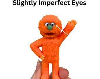 Imperfect Orange Toy Figure