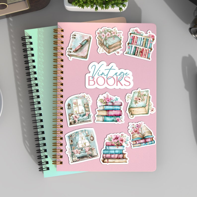 May include: A set of eight vintage book themed stickers with watercolor illustrations of books, flowers, and a cozy reading nook. The stickers are on a pink background with the text "Vintage Books".
