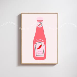 May include: A pink ketchup bottle with a white label that says "Neuro Spicy" and a red chilli pepper illustration. The bottle is on a pink background.