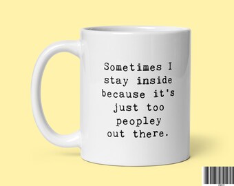 May include: White ceramic mug with a black text saying "Sometimes I stay inside because it's just too peopley out there."