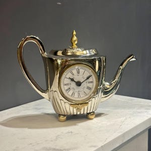 Elegant Teapot-Inspired Stainless Steel Table Clock – Unique Home Decor Piece - Kitchen Decor Ornament