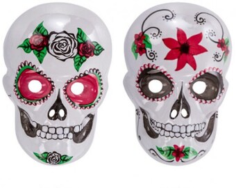 Máscaras de calavera transparentes hechas a mano del Día de los Muertos con diseño floral