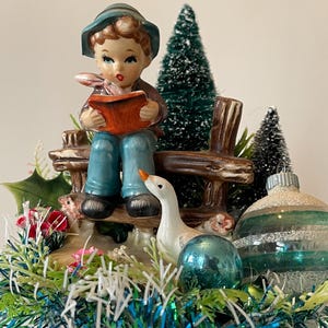 Vintage Christmas Assemblage.  1940’s E.O.Brody milkglass planter with boy and goose ,bottle brush tree,vintage ornaments, vintage tinsel