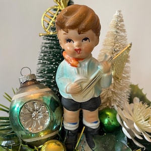 Vintage Christmas Assemblage.  1940’s E.O.Brody milkglass planter with boy and goose ,bottle brush tree,vintage ornaments, vintage tinsel